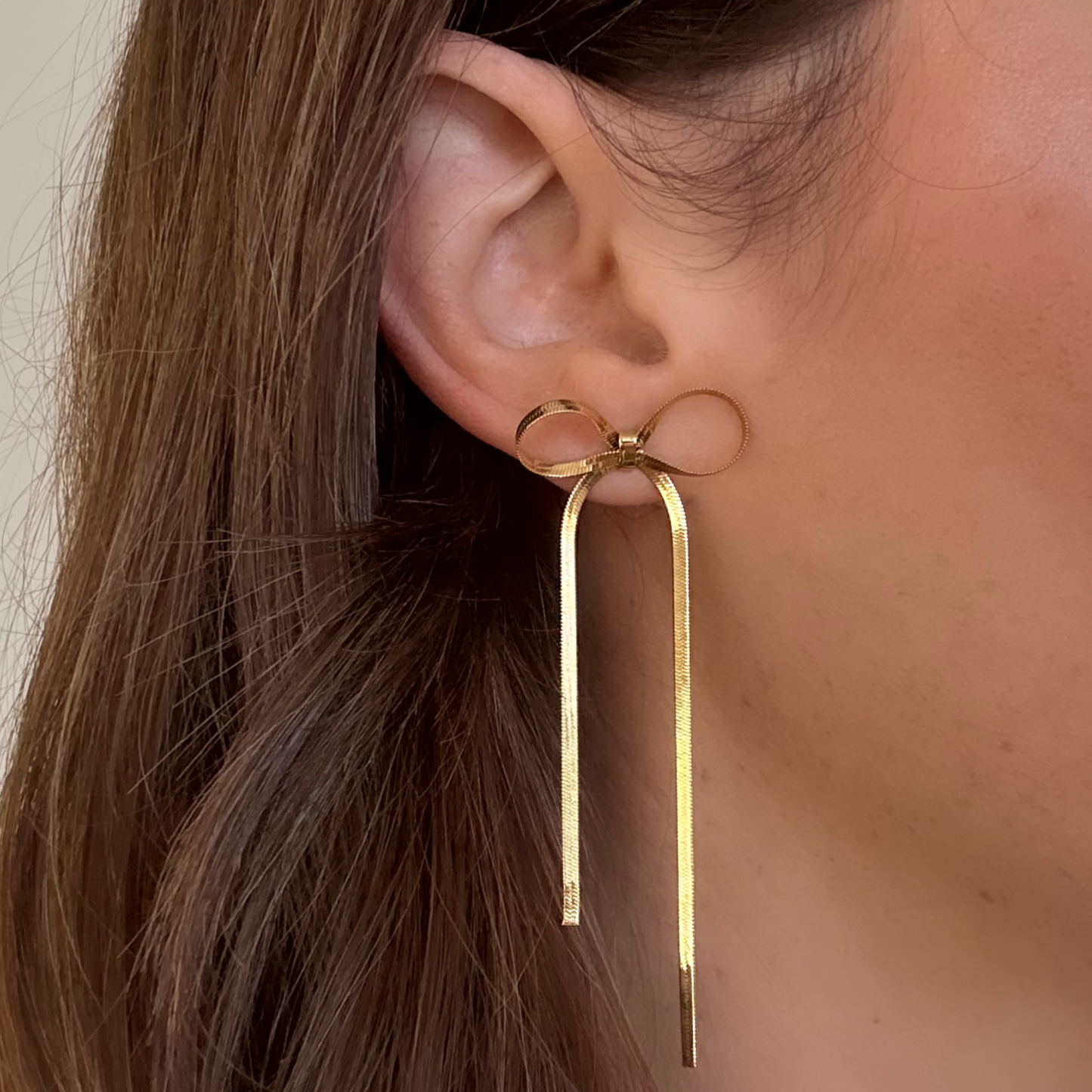 Bow earrings gold