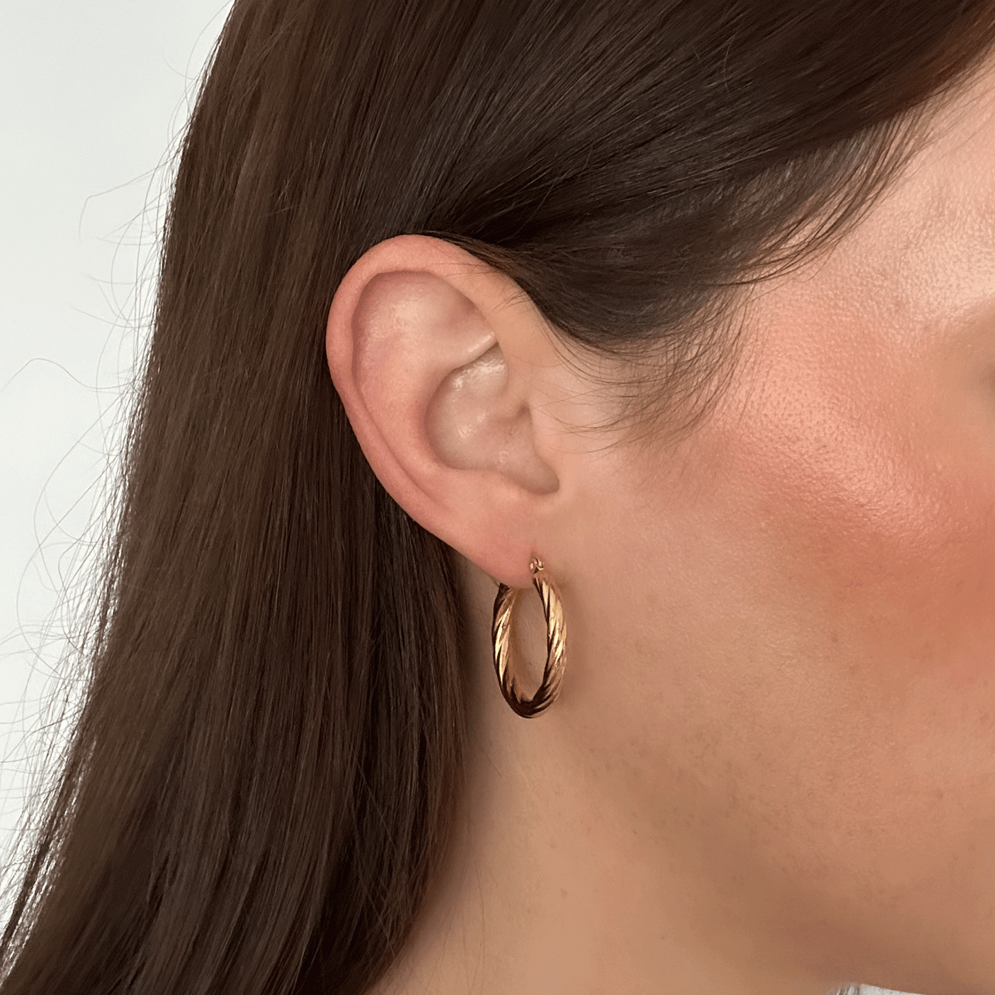 TWIST MEDIUM HOOPS GOLD